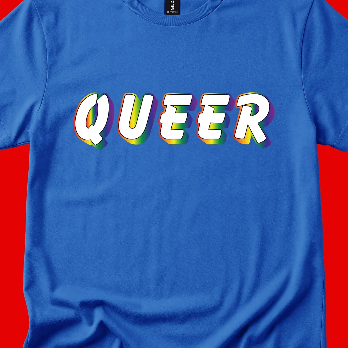 The word QUEER in large bold white letters with vibrant rainbow gradient fill and 3D orange outline effect on gray background