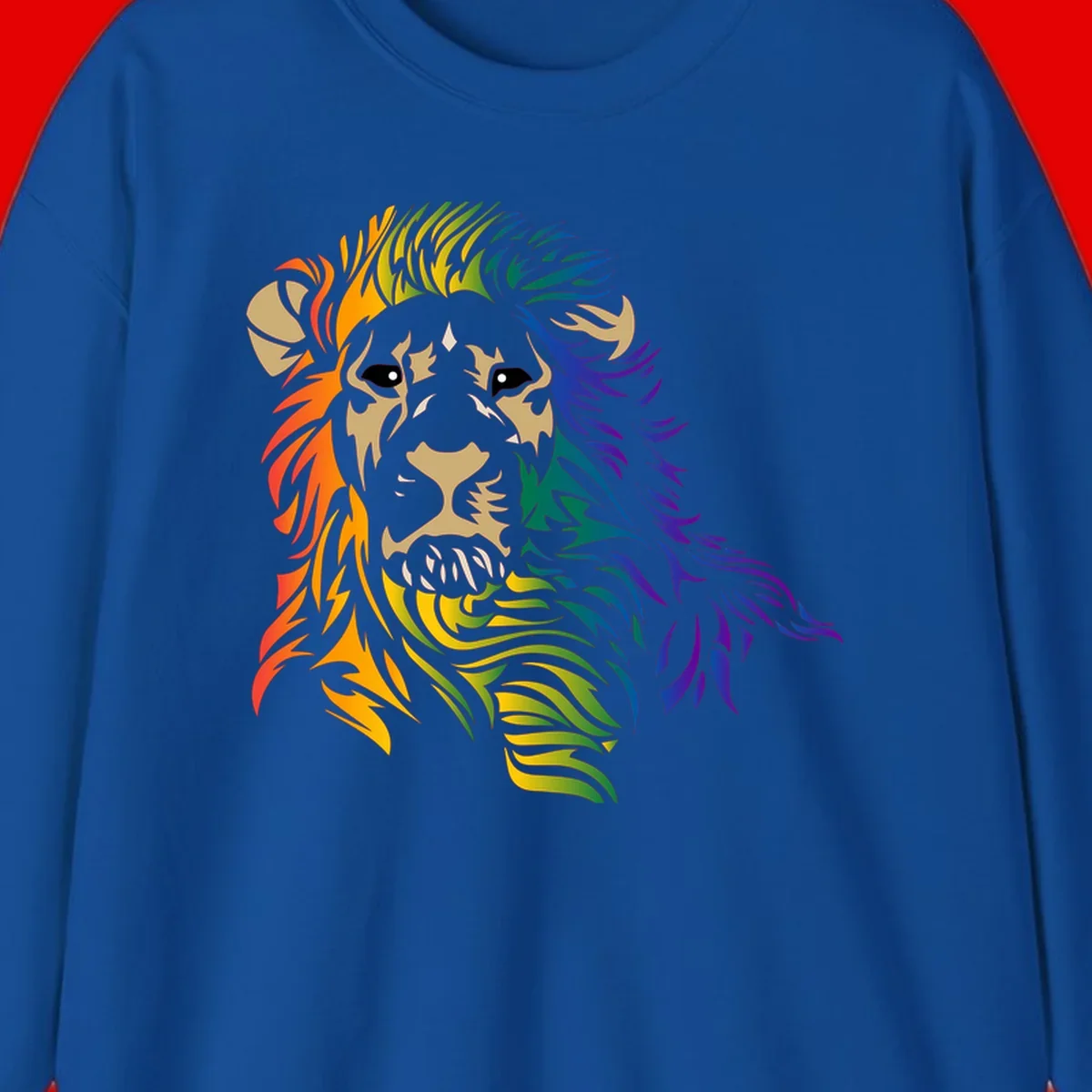 Rainbow lion head with gradient mane flowing from red through purple, featuring tan face with black eyes and detailed whiskers on gray background