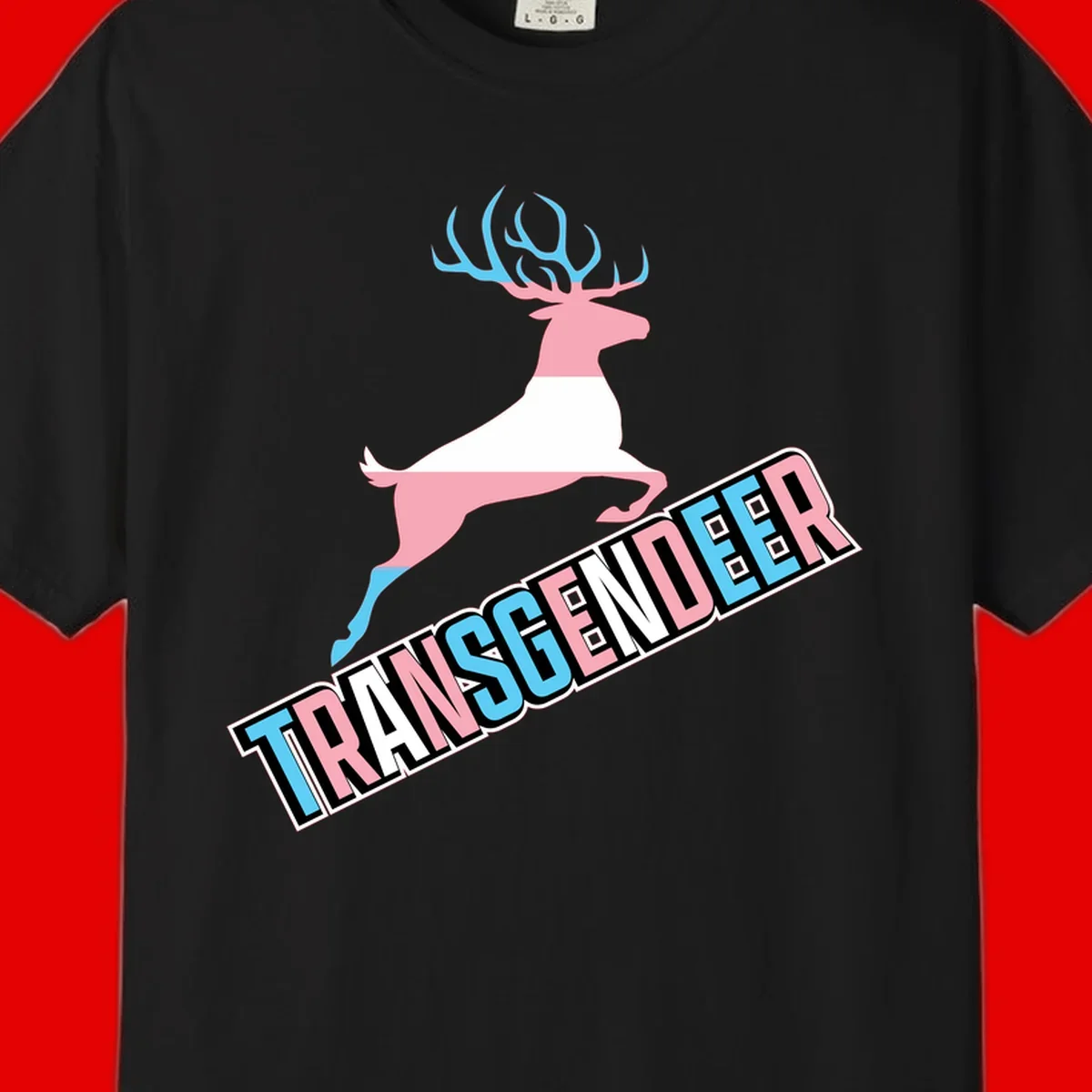 Transgender deer pride design: pink and white deer leaping with blue and pink antlers, 'TRANSGENDER' text banner below in pride colors