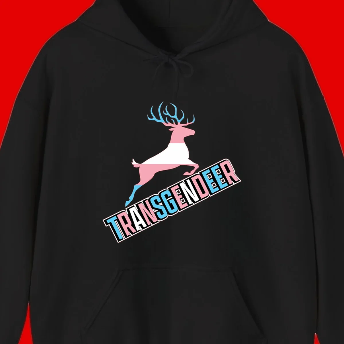 Transgender deer pride design: pink and white deer leaping with blue and pink antlers, 'TRANSGENDER' text banner below in pride colors