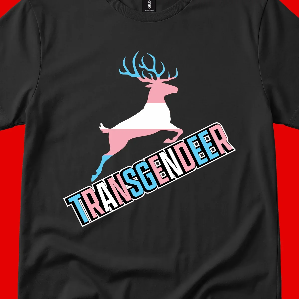 Transgender deer pride design: pink and white deer leaping with blue and pink antlers, 'TRANSGENDER' text banner below in pride colors