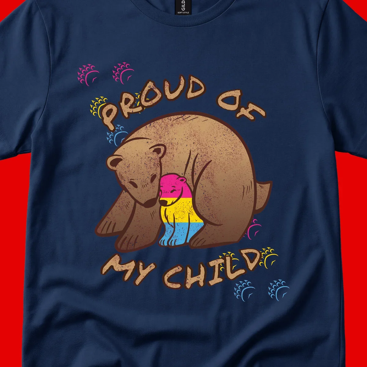 Large bear proudly hugging a smaller bear cub wearing a pride flag shirt, with text reading 'Proud As My Child'