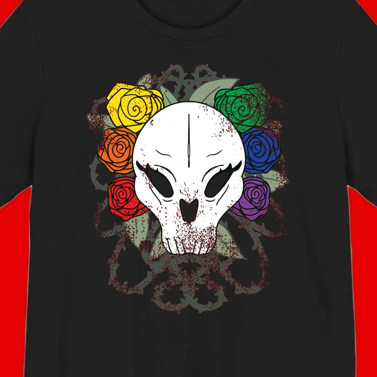 White skull with rainbow colored roses in yellow, orange, red, blue, green, and purple surrounding it on gray background