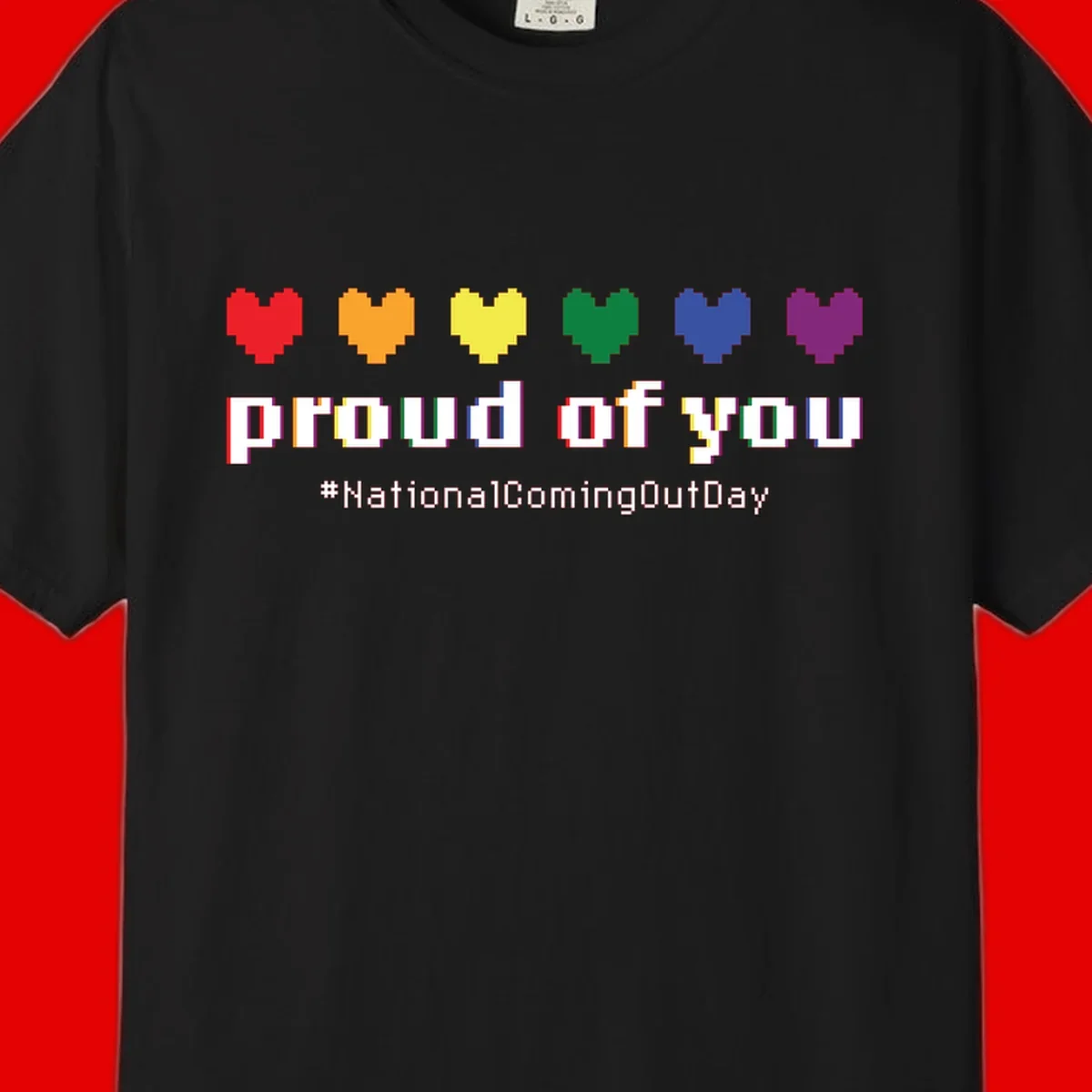 Pixel-art design with six rainbow hearts and text reading 'proud of you #NationalComingOutDay' celebrating coming out visibility