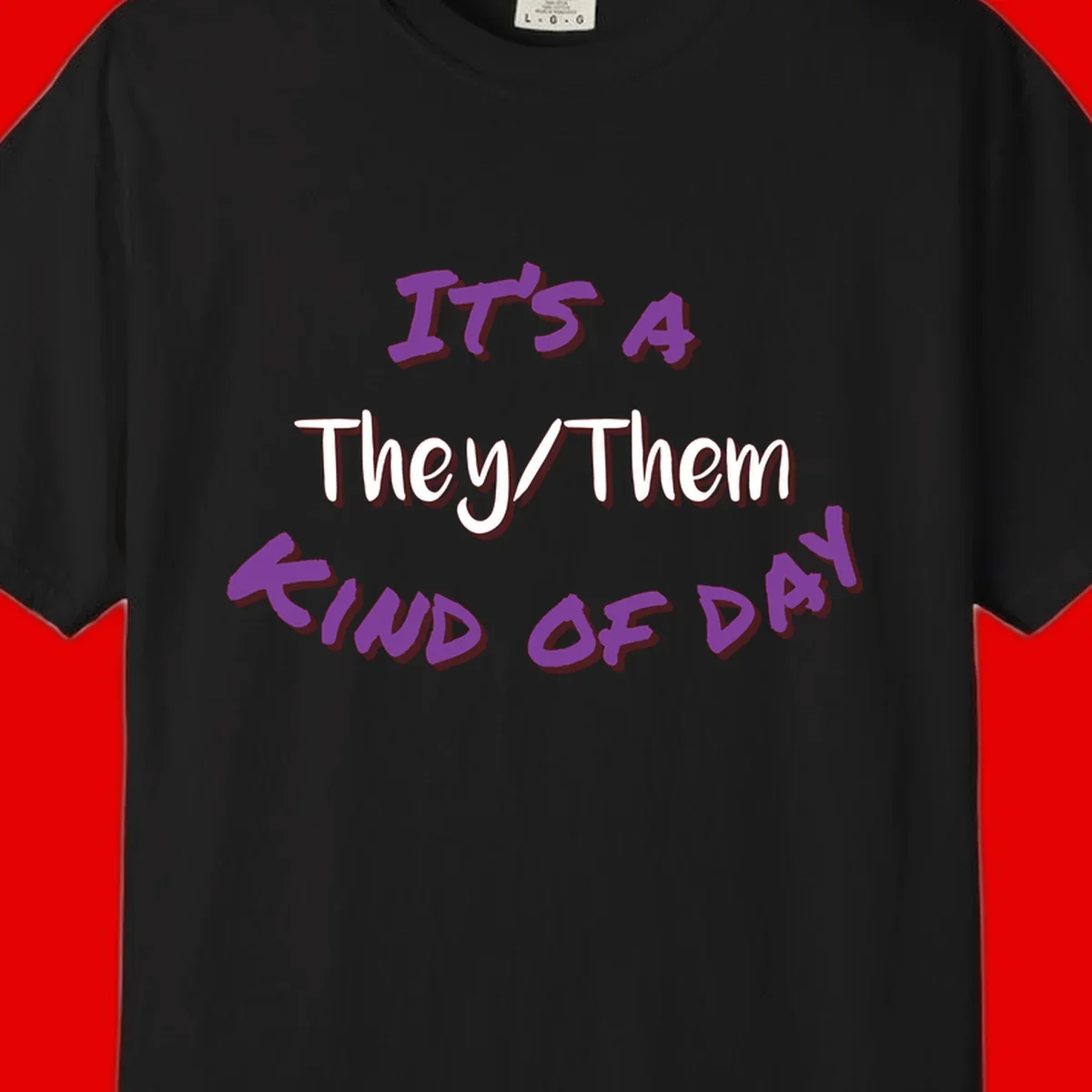 Purple 3D text reading 'IT'S 4 They/Them PROUD OF ME' with shadow effects on gray background