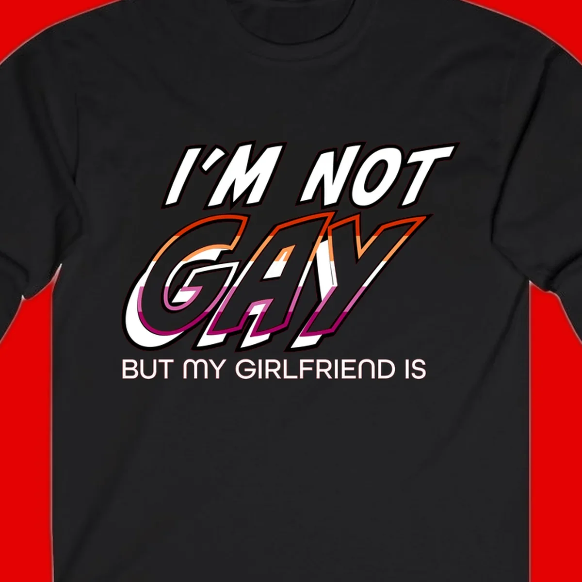 Bold typography design reading 'I'm not gay but my girlfriend is' in orange and magenta layered 3D letters