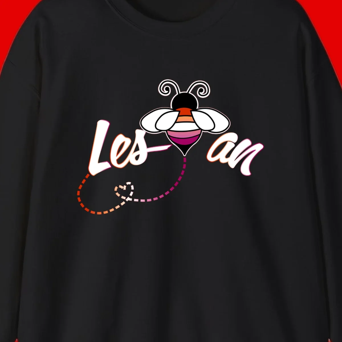 Colorful bee with spiral antennae and rainbow striped body above the word Love in flowing lettering with dashed trail