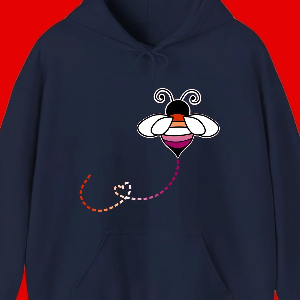 Illustrated rainbow pride bee with spiral antennae, white wings, and colorful striped body with dotted flight path