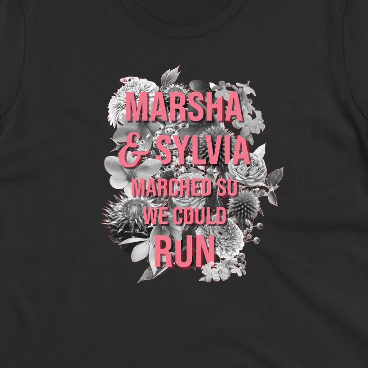 Pink text reading 'Marsha & Sylvia Marched So We Could Run' overlaid on black and white floral arrangement with roses and dahlias