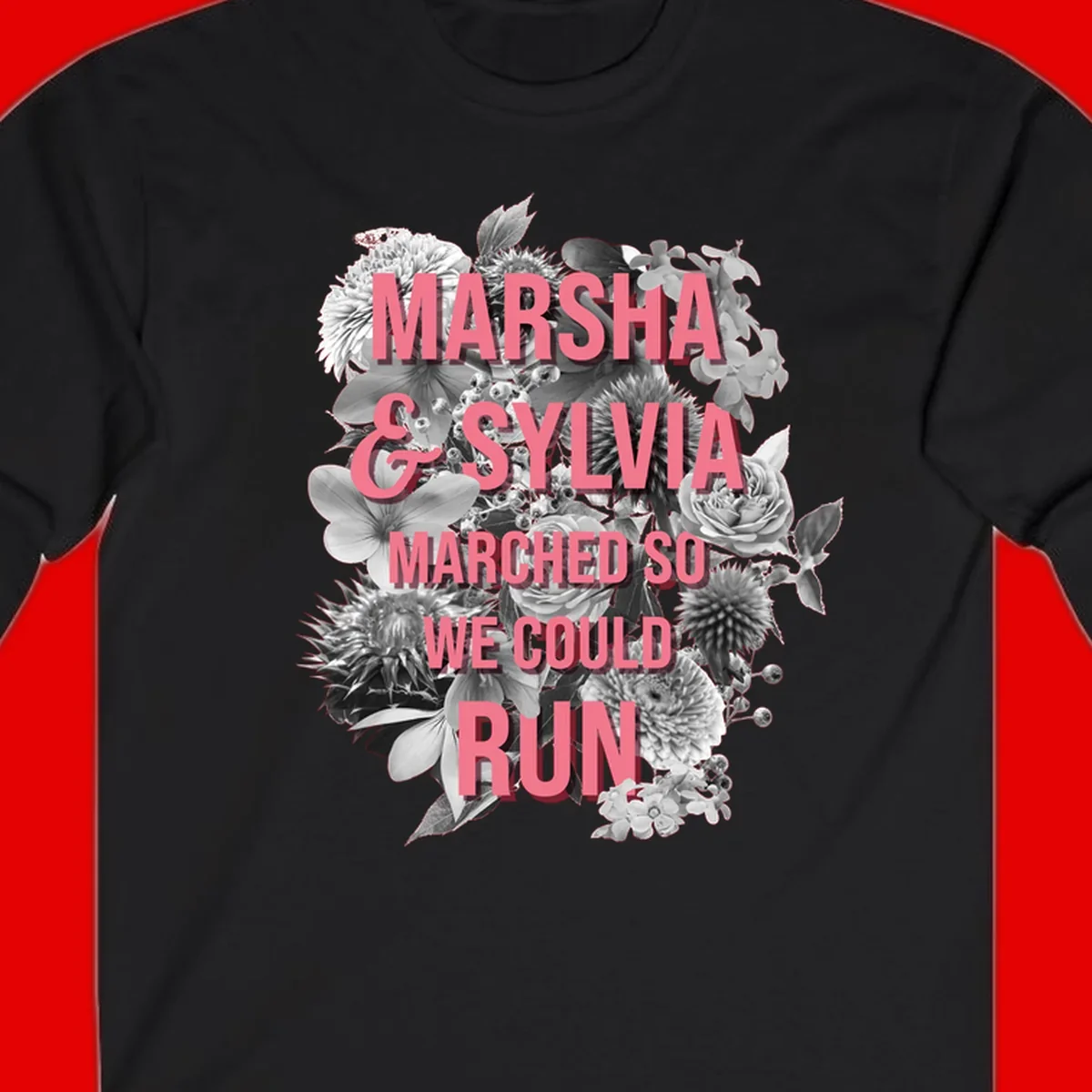 Pink text reading 'Marsha & Sylvia Marched So We Could Run' overlaid on black and white floral arrangement with roses and dahlias