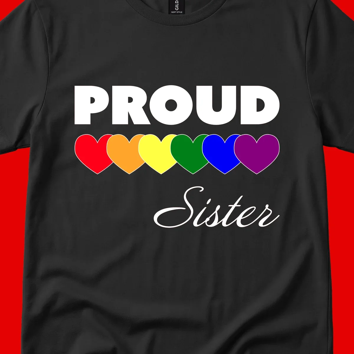 Proud Sister Pride design with bold white text and six rainbow-colored hearts representing LGBTQ pride flag colors on gray background