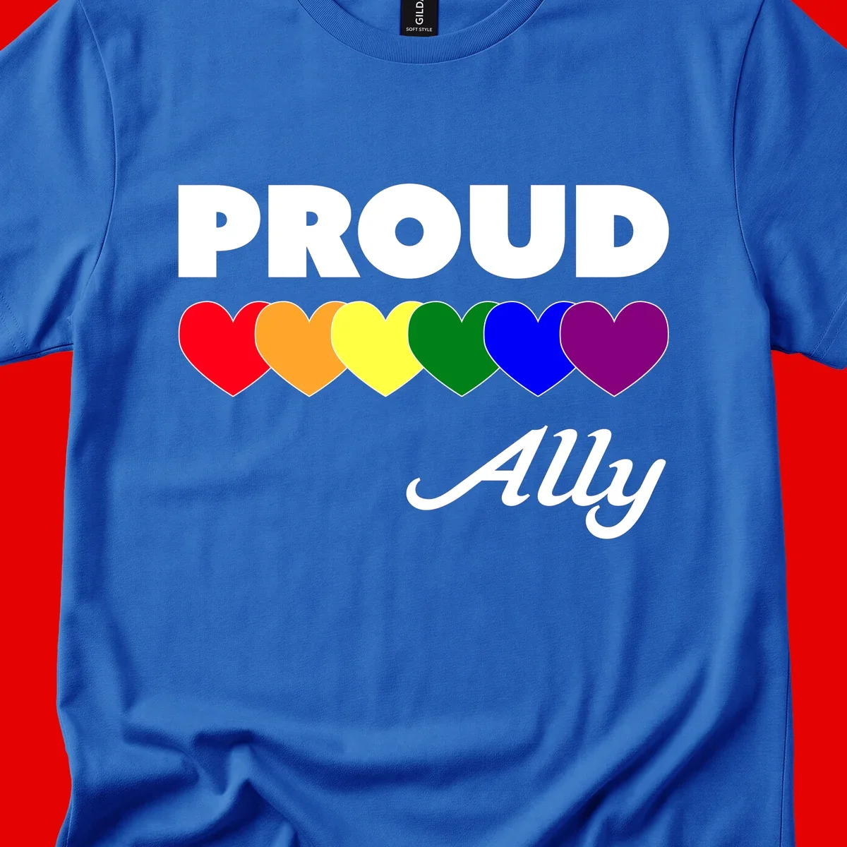 Proud Ally design with rainbow hearts in red, orange, yellow, green, blue, and purple on gray background