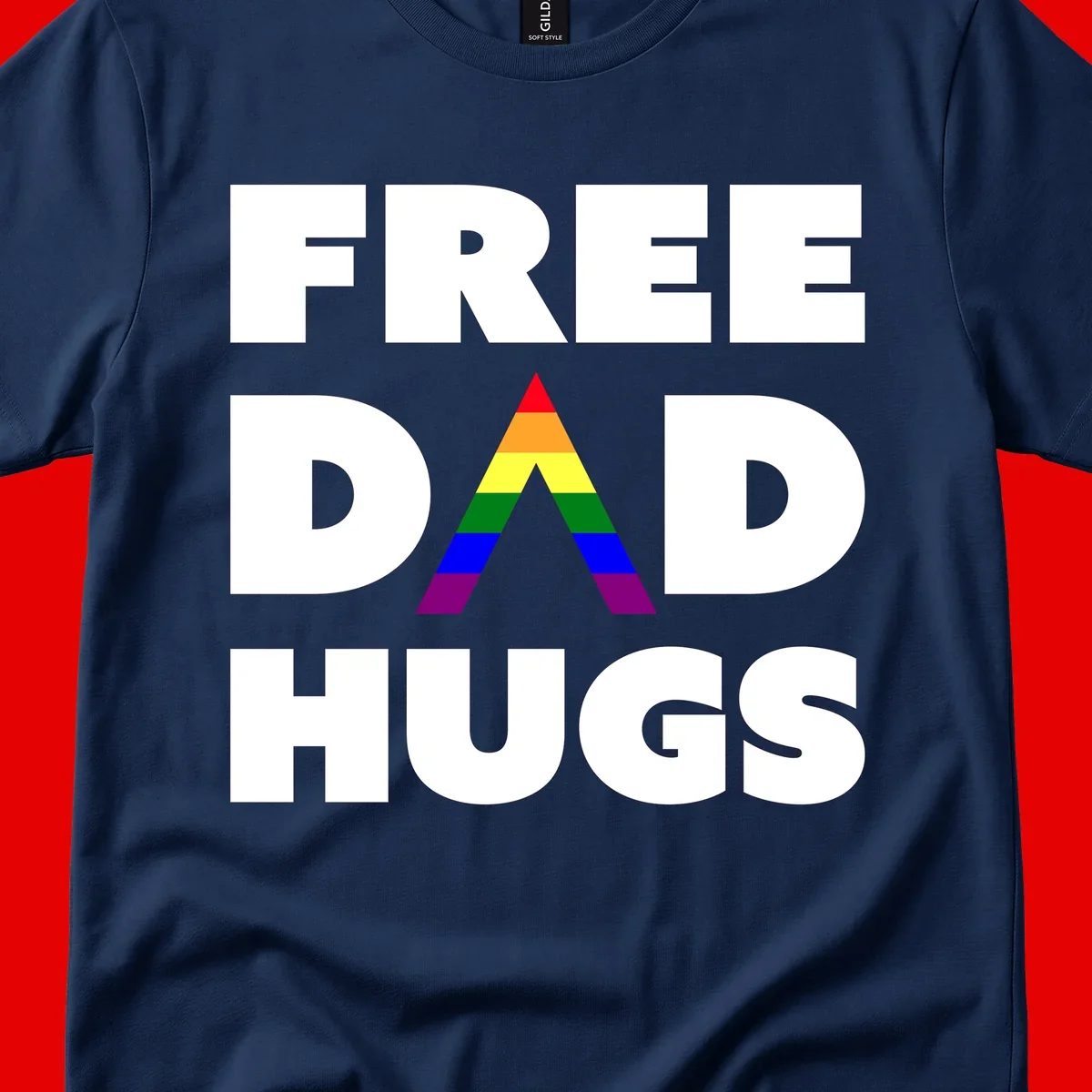 Free Dad Hugs pride design featuring a colorful rainbow triangle with red, orange, yellow, green, blue, and purple stripes