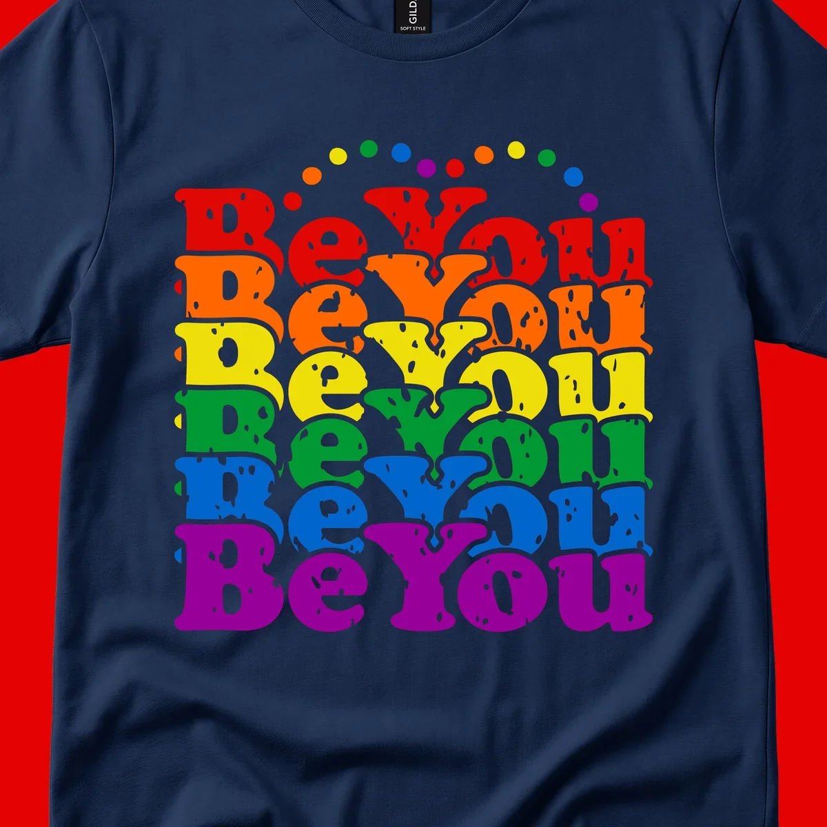 Stacked rainbow-colored letters spelling 'Beyond The Rainbow' with grunge texture and floating colorful circles, pride celebration design