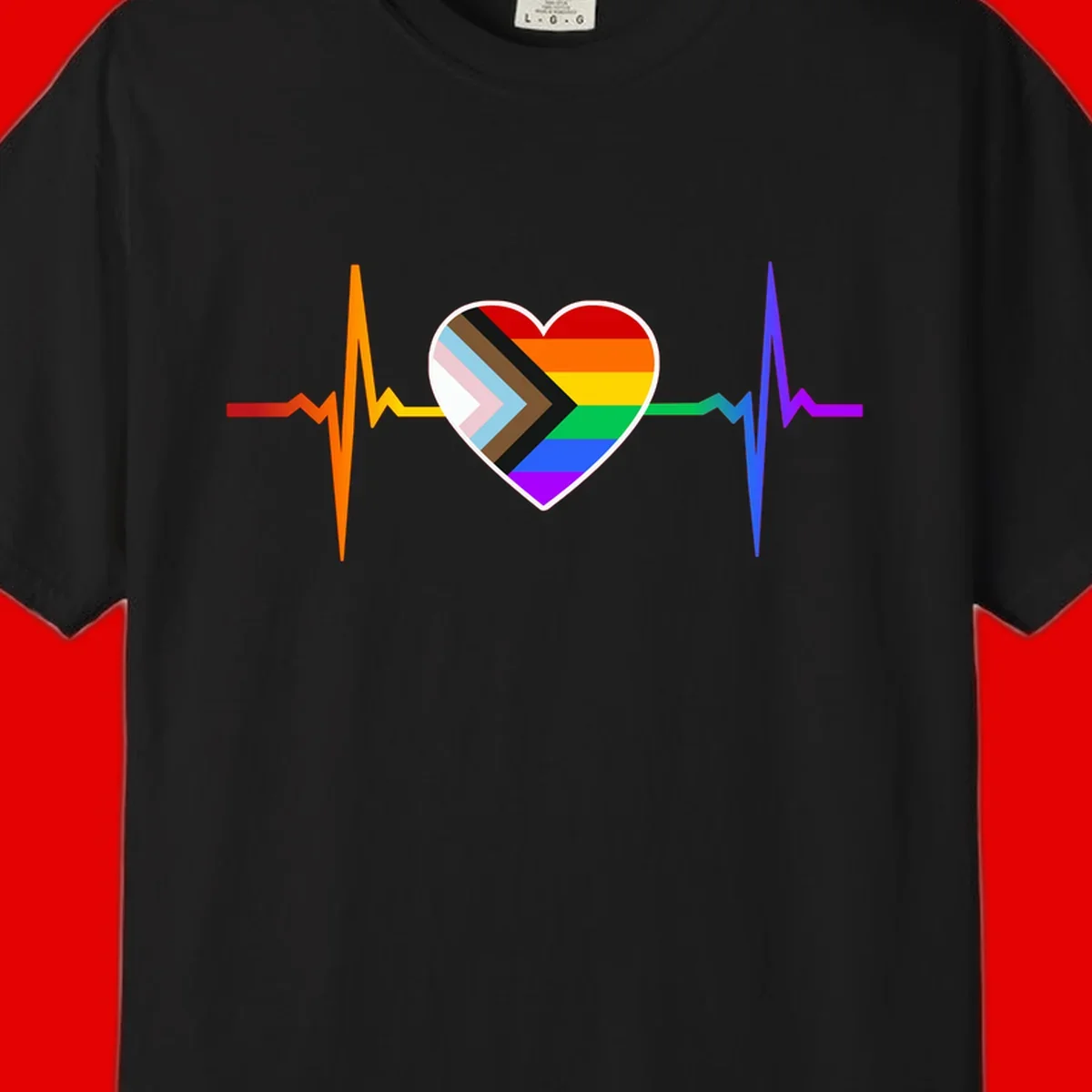 Progress pride heartbeat design featuring a rainbow heart with progress chevron arrow and electrocardiogram pulse line