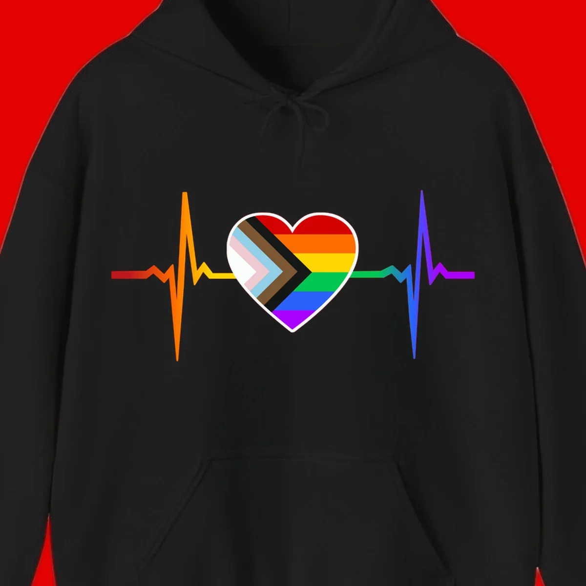 Progress pride heartbeat design featuring a rainbow heart with progress chevron arrow and electrocardiogram pulse line