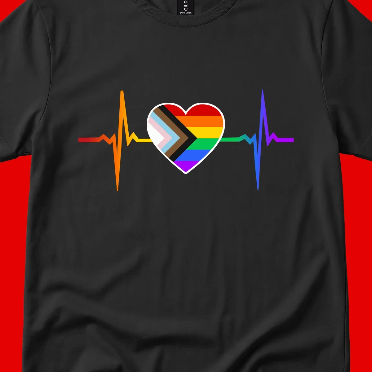 Progress pride heartbeat design featuring a rainbow heart with progress chevron arrow and electrocardiogram pulse line