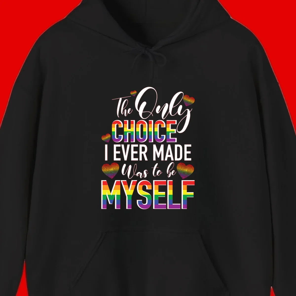 Pride-themed design with rainbow-striped text reading 'The Only Choice I Ever Made Was to be Myself' surrounded by colorful hearts