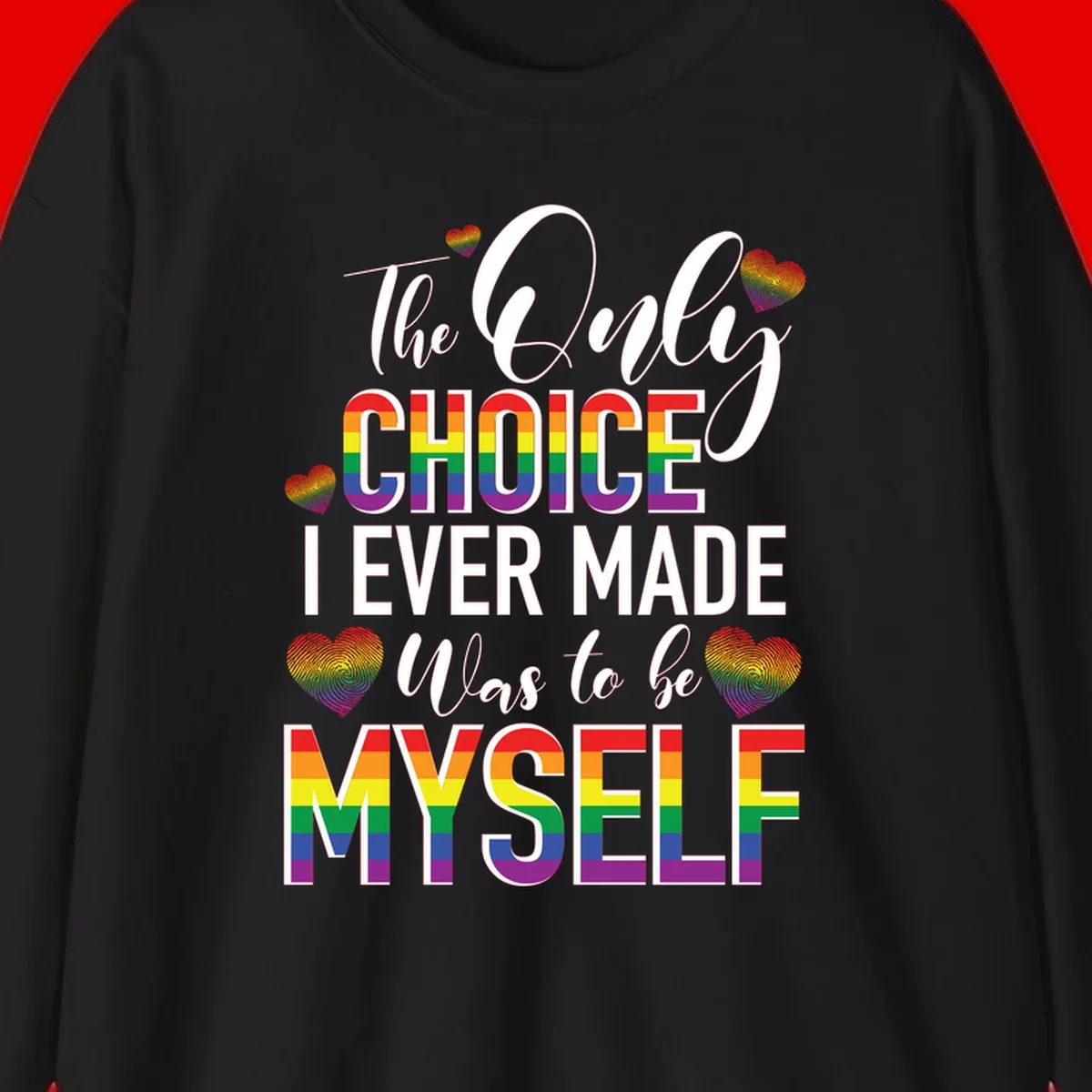 Pride-themed design with rainbow-striped text reading 'The Only Choice I Ever Made Was to be Myself' surrounded by colorful hearts