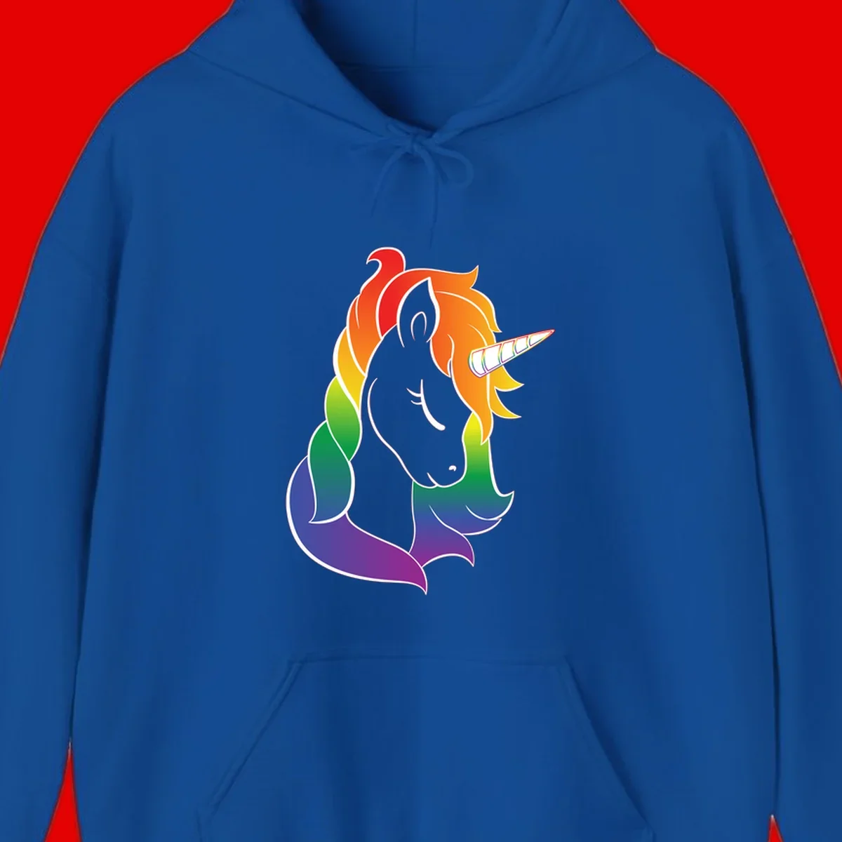 Rainbow pride unicorn illustration with gray head, multicolor mane and tail, and spiral horn in red, orange, yellow, green, blue, and purple