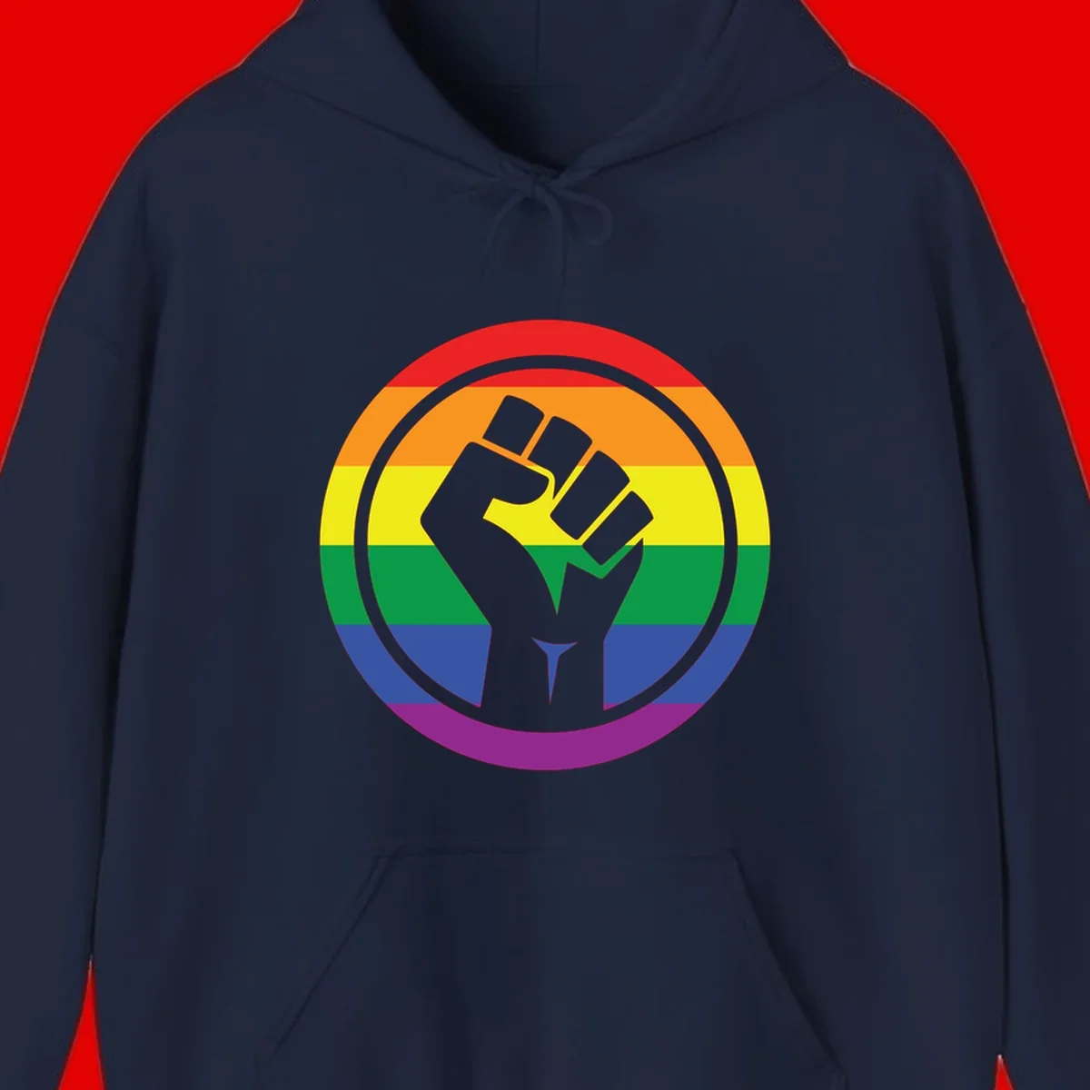 Raised fist silhouette on rainbow pride stripes within circular badge design symbolizing LGBTQ+ solidarity and activism
