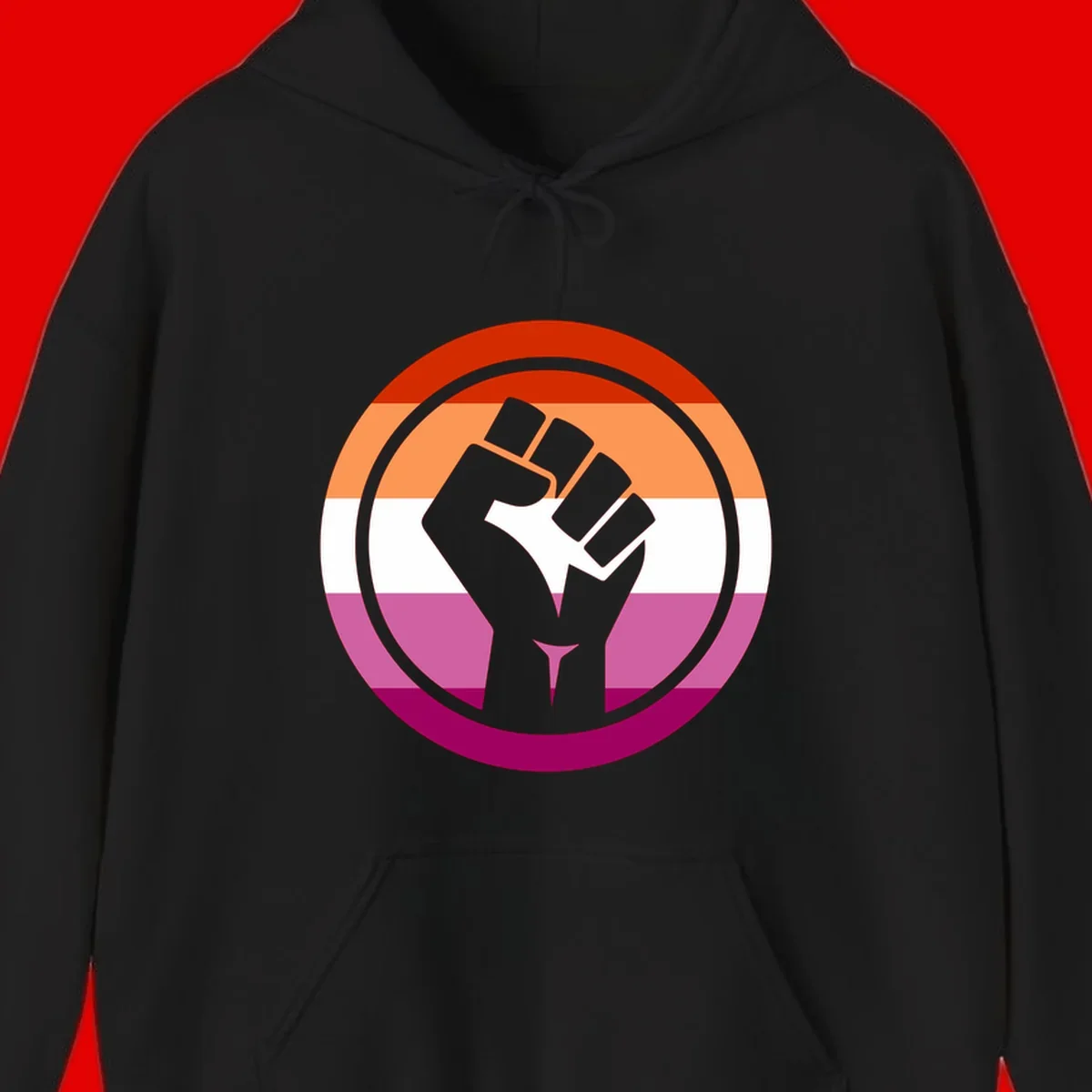Raised fist silhouette on rainbow pride flag stripes within concentric circles, symbolizing LGBTQ+ strength and solidarity