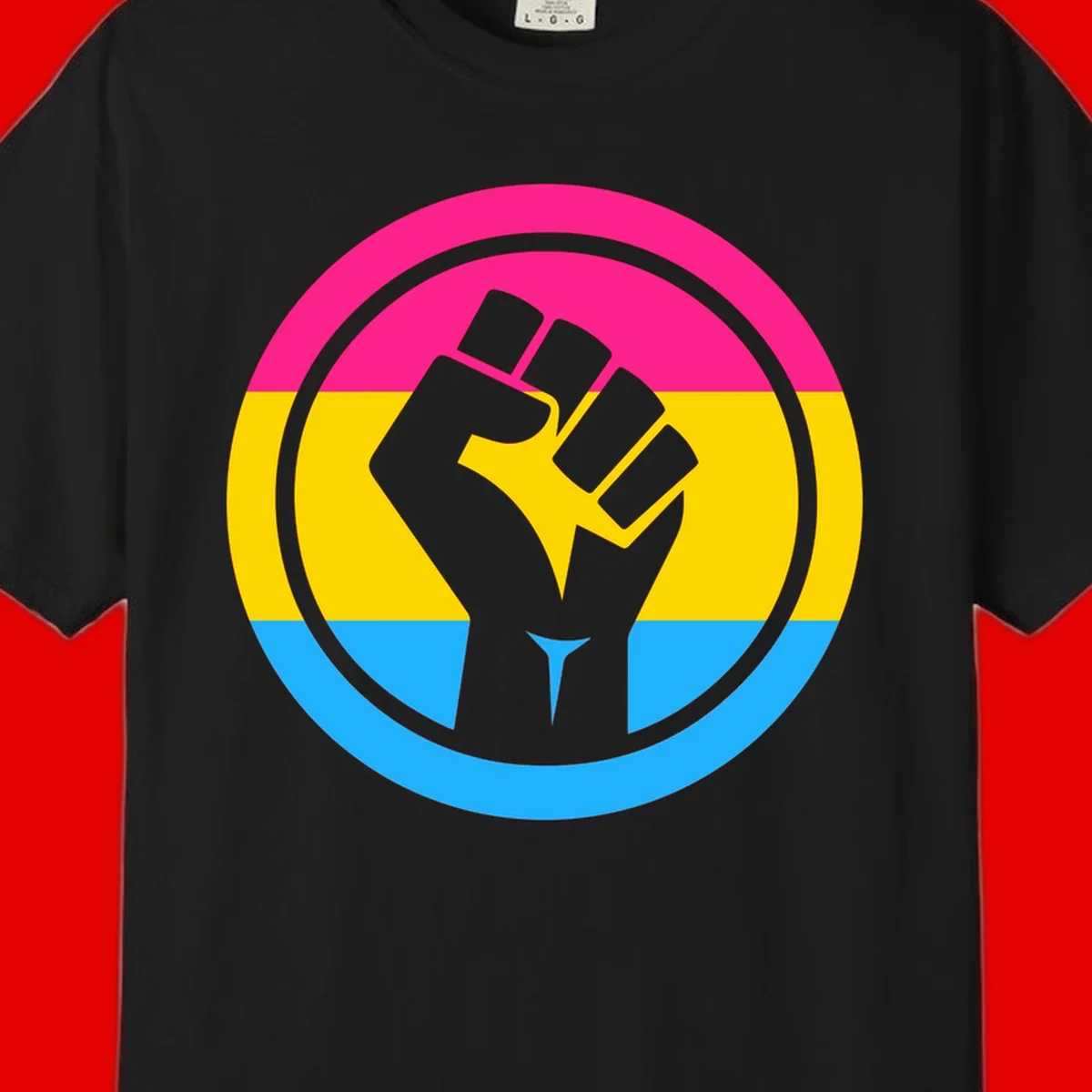 Raised fist silhouette in circular badge with magenta, yellow, and blue pride stripes symbolizing fist-pride-power and activism