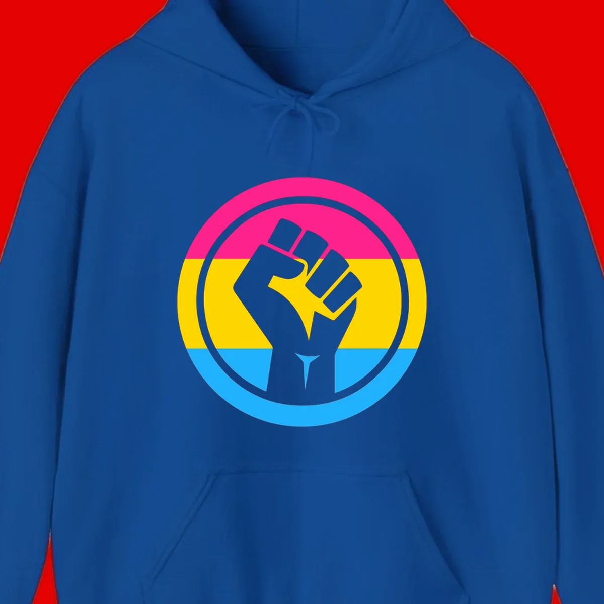 Raised fist silhouette in circular badge with magenta, yellow, and blue pride stripes symbolizing fist-pride-power and activism