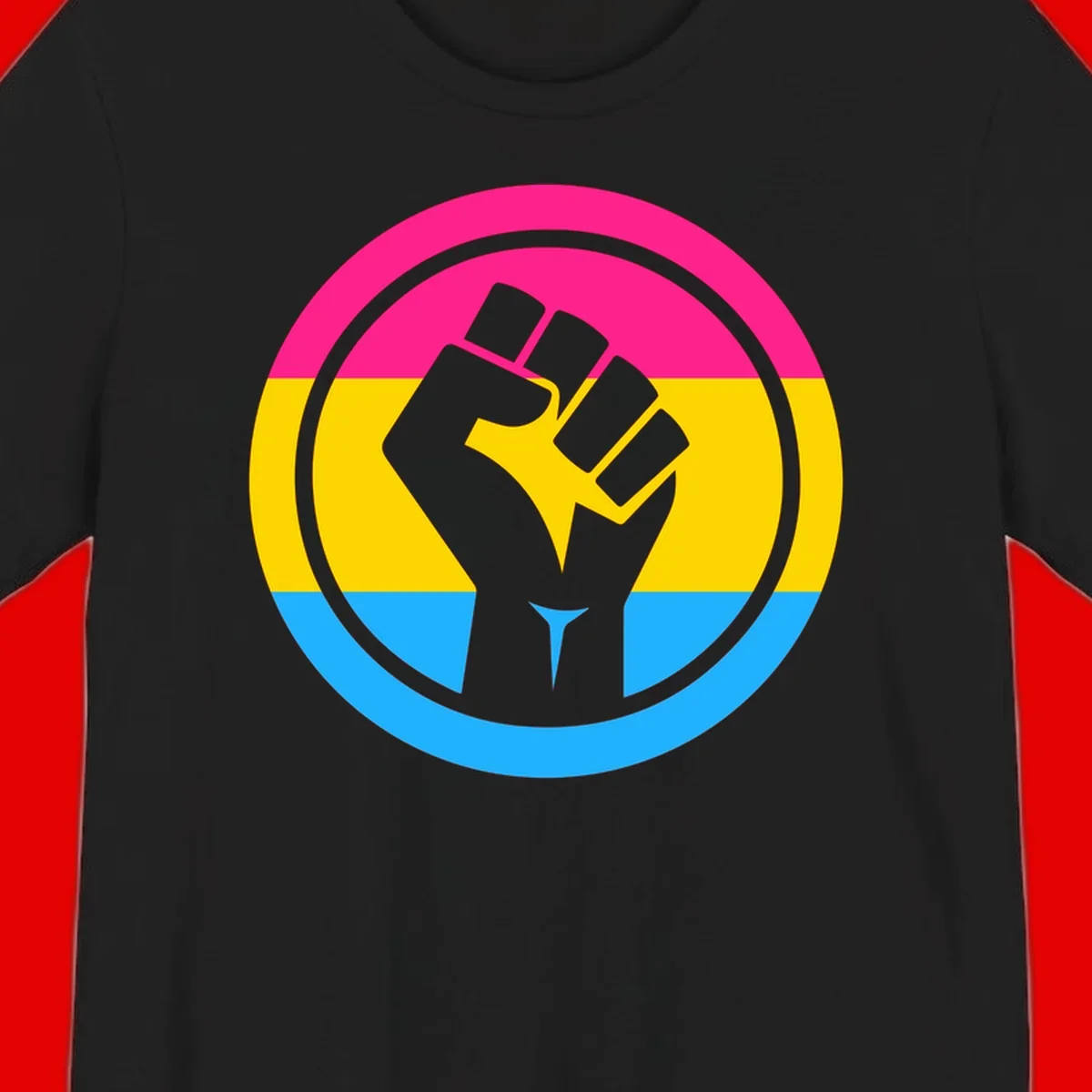 Raised fist silhouette in circular badge with magenta, yellow, and blue pride stripes symbolizing fist-pride-power and activism