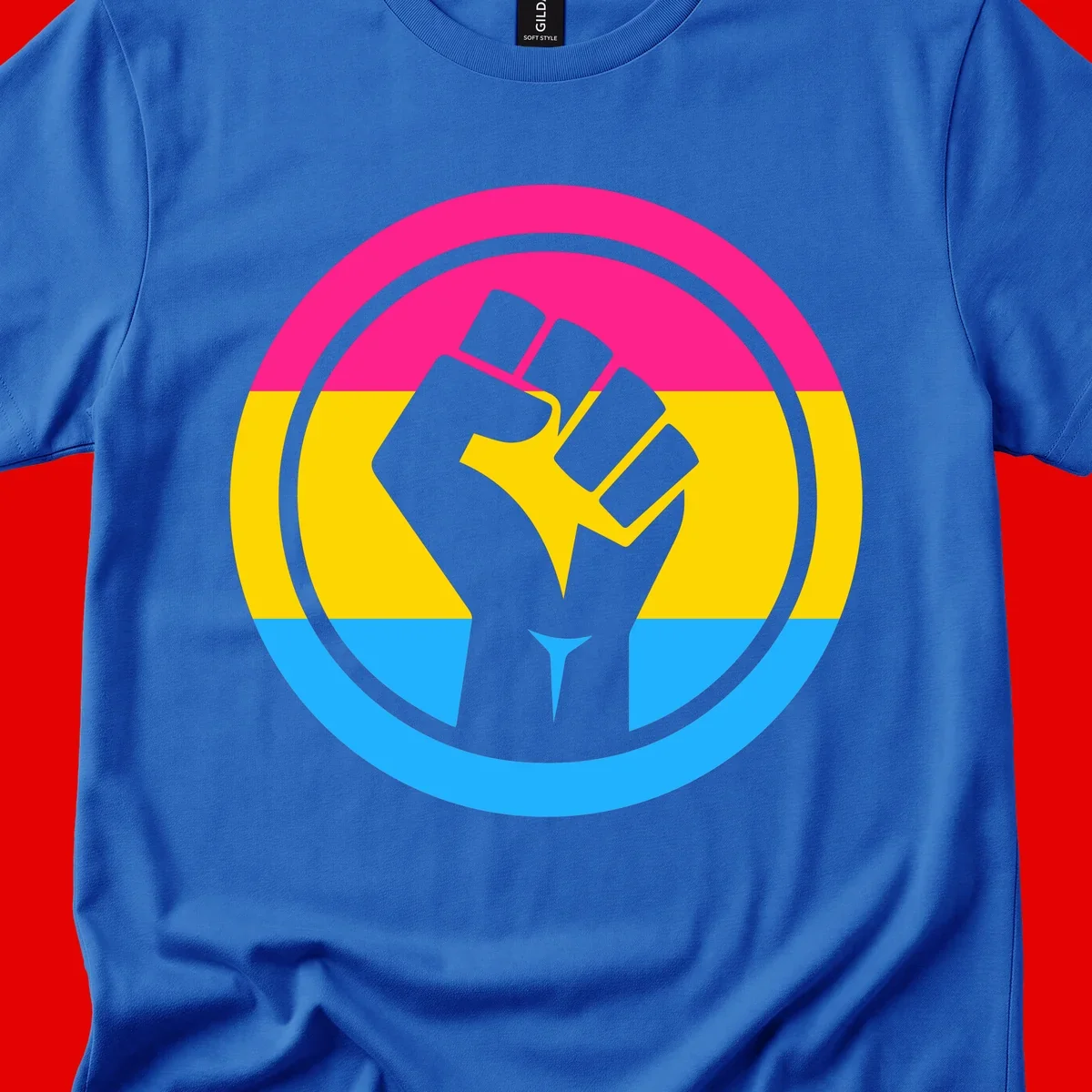 Raised fist silhouette in circular badge with magenta, yellow, and blue pride stripes symbolizing fist-pride-power and activism