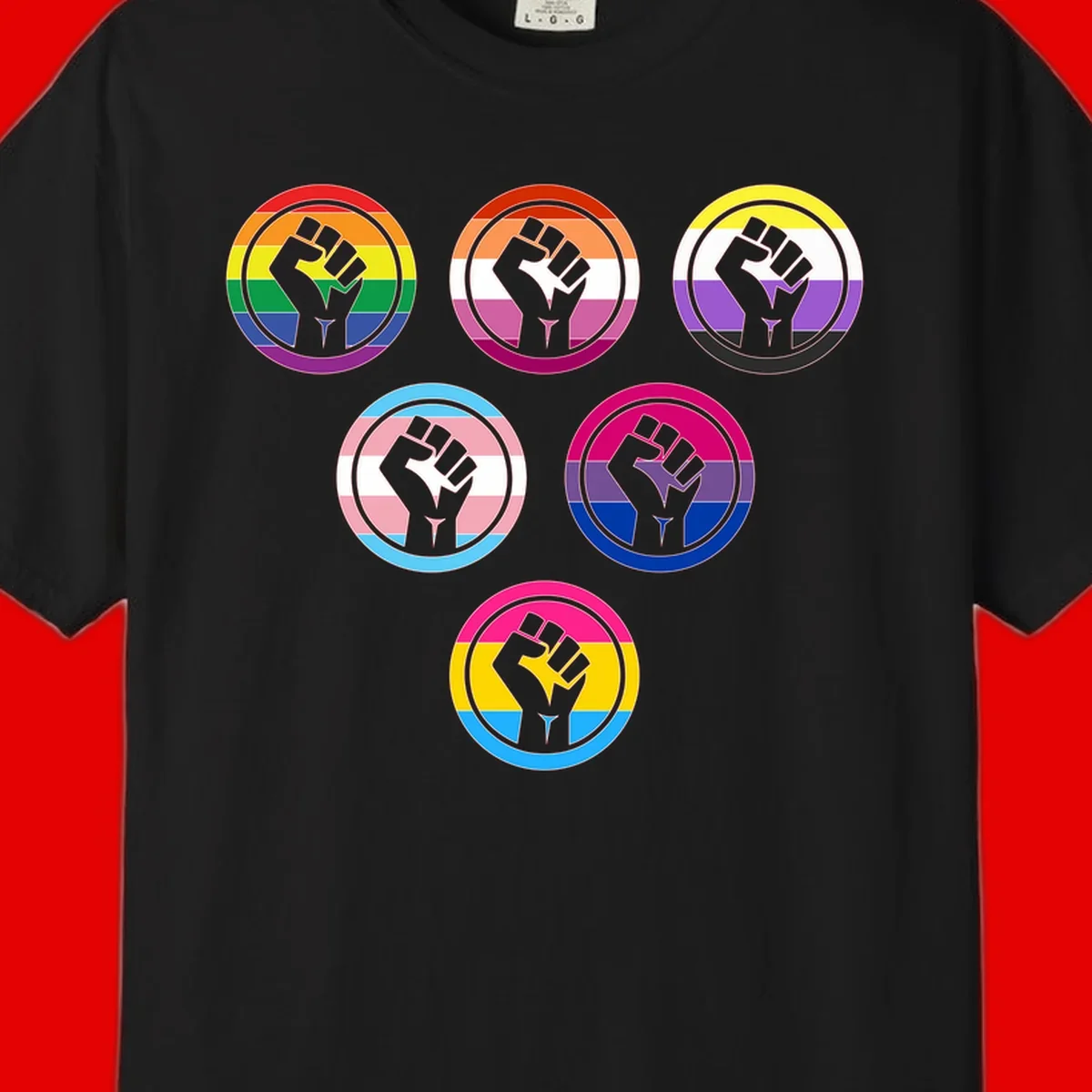Six circular badge designs with raised fist symbols in different pride flag color schemes including rainbow, trans, and pansexual flags