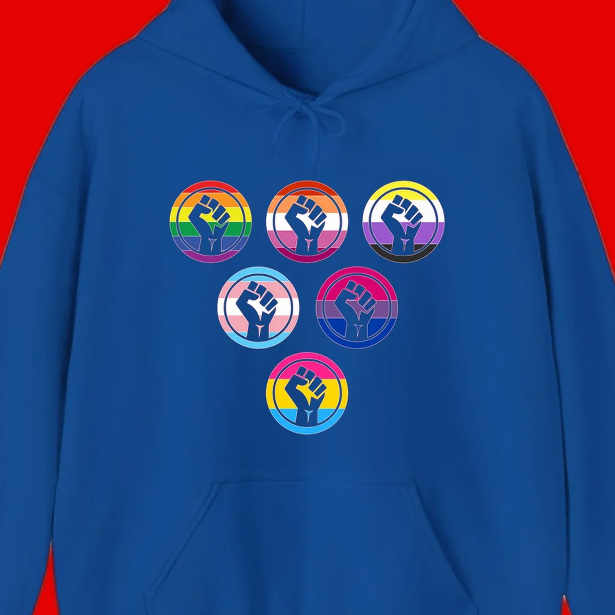 Six circular badge designs with raised fist symbols in different pride flag color schemes including rainbow, trans, and pansexual flags