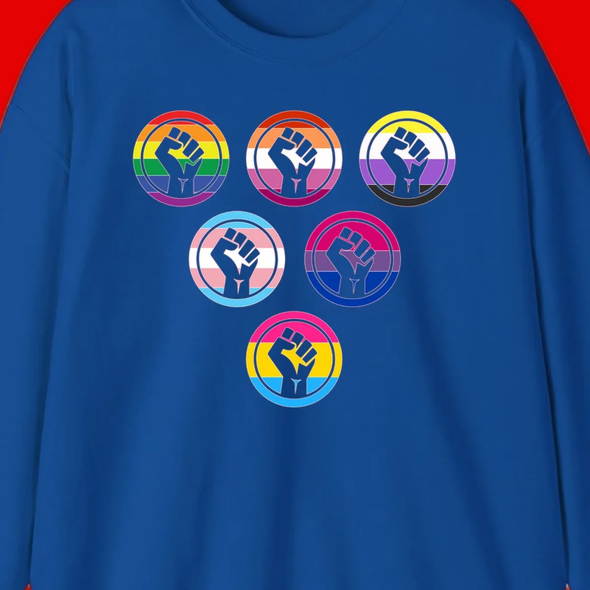 Six circular badge designs with raised fist symbols in different pride flag color schemes including rainbow, trans, and pansexual flags