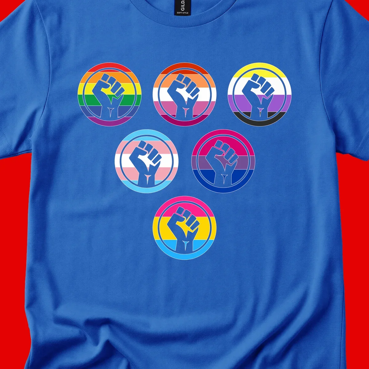 Six circular badge designs with raised fist symbols in different pride flag color schemes including rainbow, trans, and pansexual flags