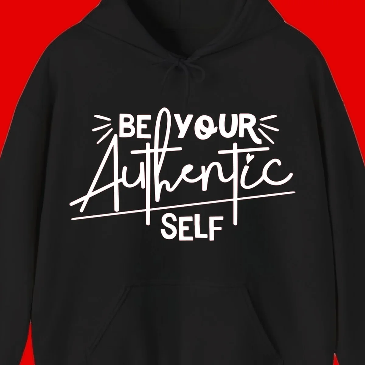 White hand-lettered text reading 'Be Your Authentic Self' with decorative radiating lines and a small heart on gray background