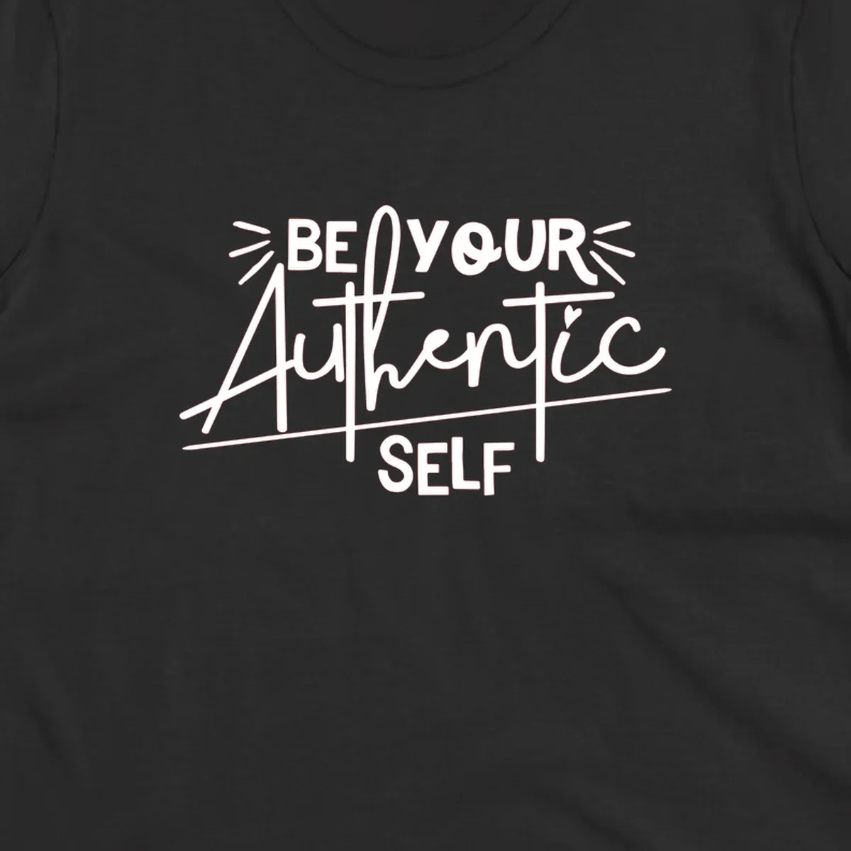 White hand-lettered text reading 'Be Your Authentic Self' with decorative radiating lines and a small heart on gray background
