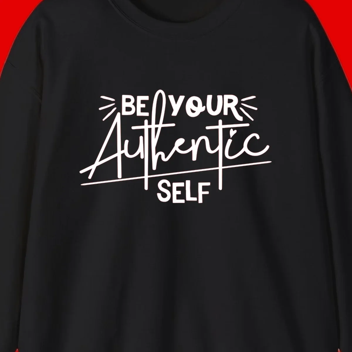 White hand-lettered text reading 'Be Your Authentic Self' with decorative radiating lines and a small heart on gray background