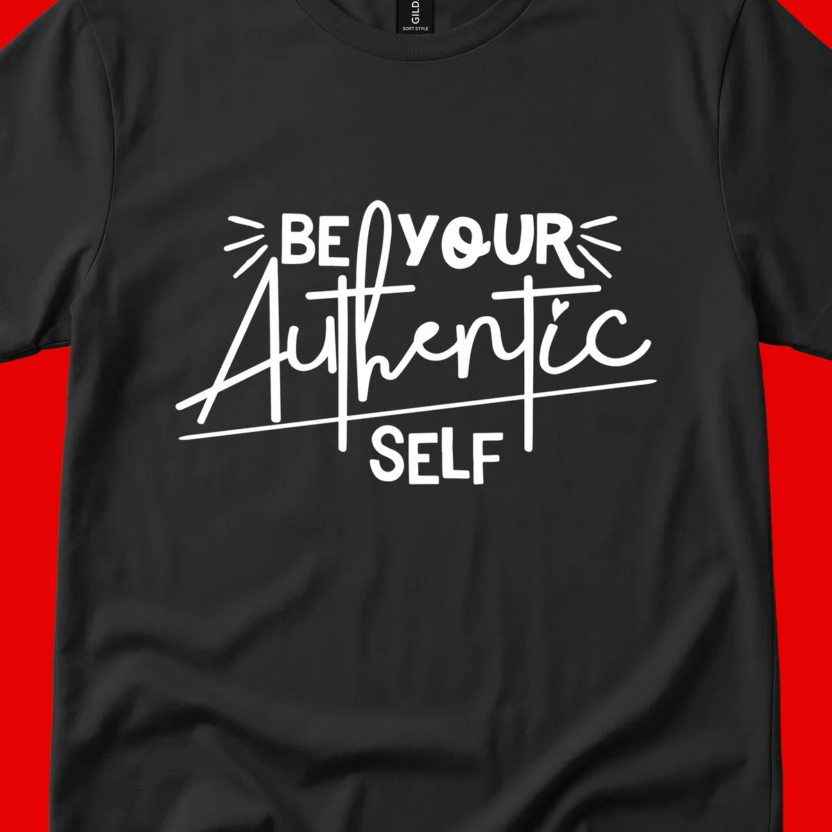 White hand-lettered text reading 'Be Your Authentic Self' with decorative radiating lines and a small heart on gray background