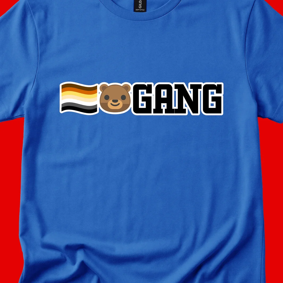 Bear gang pride design with smiling brown bear face, bear pride flag stripes, and bold 'GANG' text