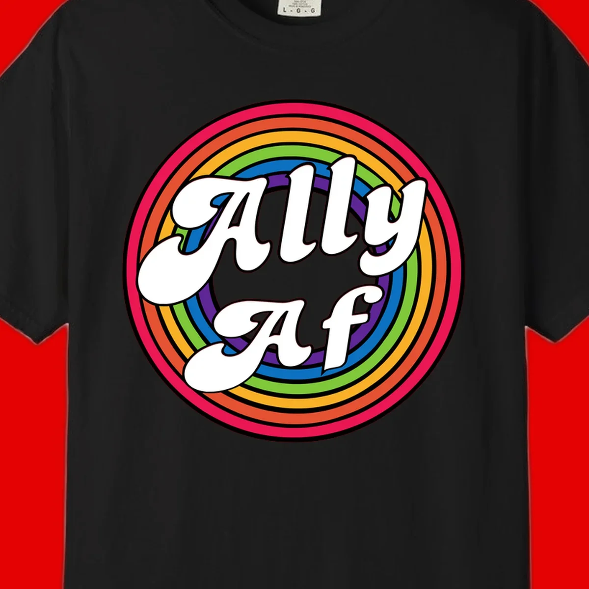 Ally AF pride design with white text surrounded by concentric rainbow circles in full spectrum colors
