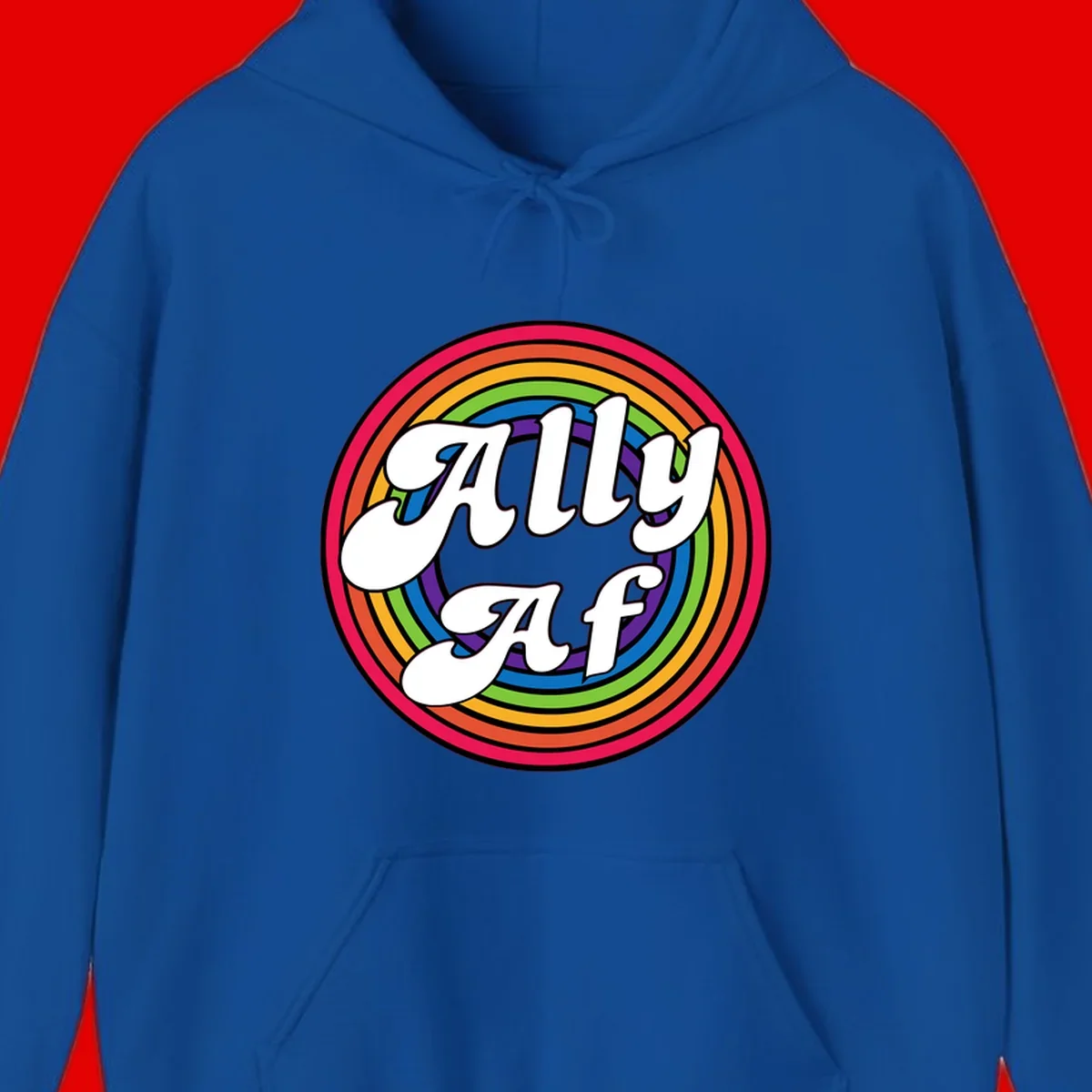 Ally AF pride design with white text surrounded by concentric rainbow circles in full spectrum colors