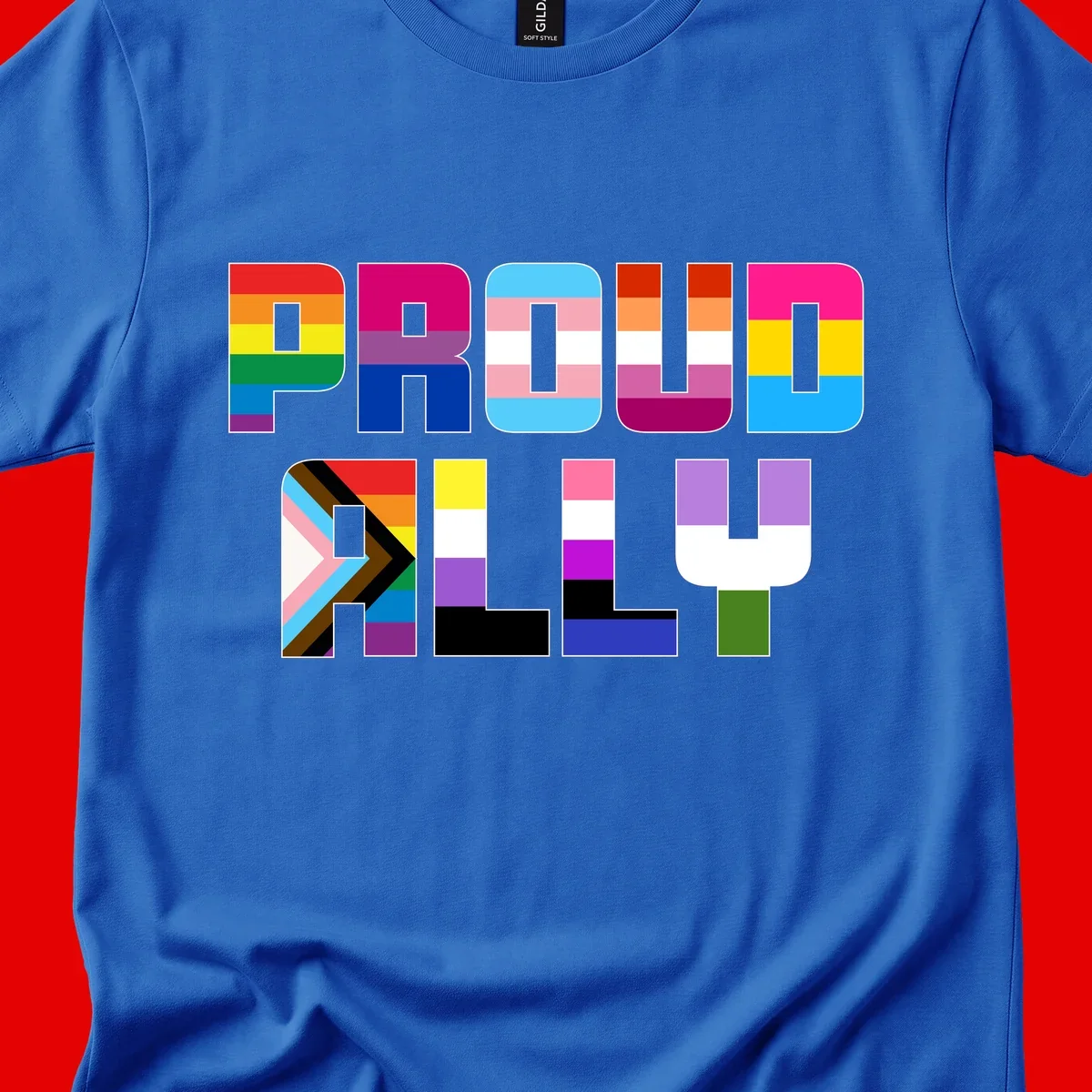 Colorful alphabet letters constructed from pride flags including rainbow, trans, and intersex designs on gray background