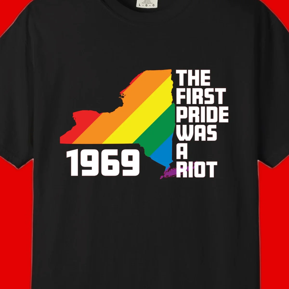 New York state map filled with rainbow pride stripes and text reading 'The First Pride Was A Riot 1969'