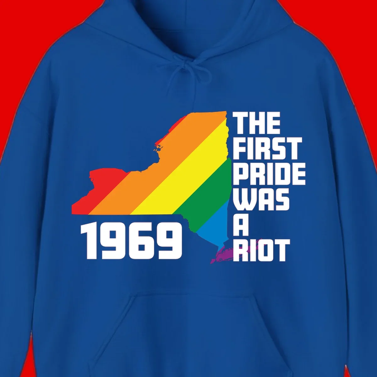 New York state map filled with rainbow pride stripes and text reading 'The First Pride Was A Riot 1969'