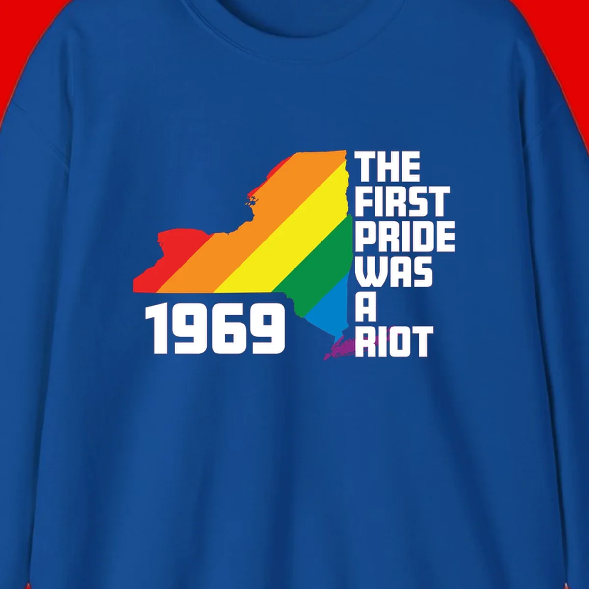 New York state map filled with rainbow pride stripes and text reading 'The First Pride Was A Riot 1969'