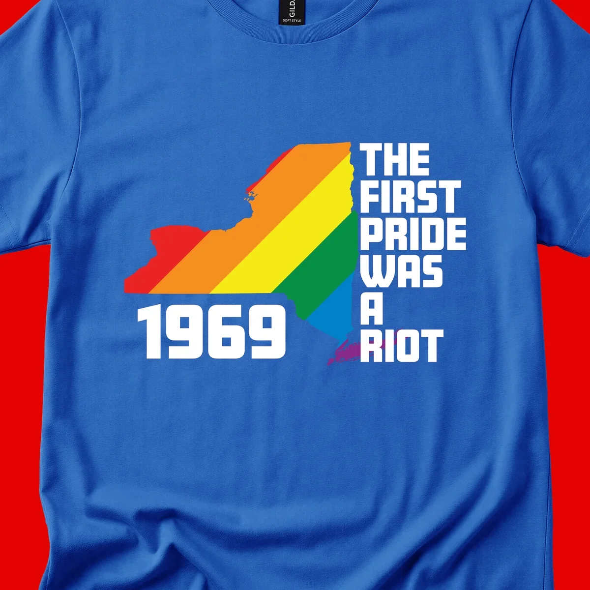 New York state map filled with rainbow pride stripes and text reading 'The First Pride Was A Riot 1969'
