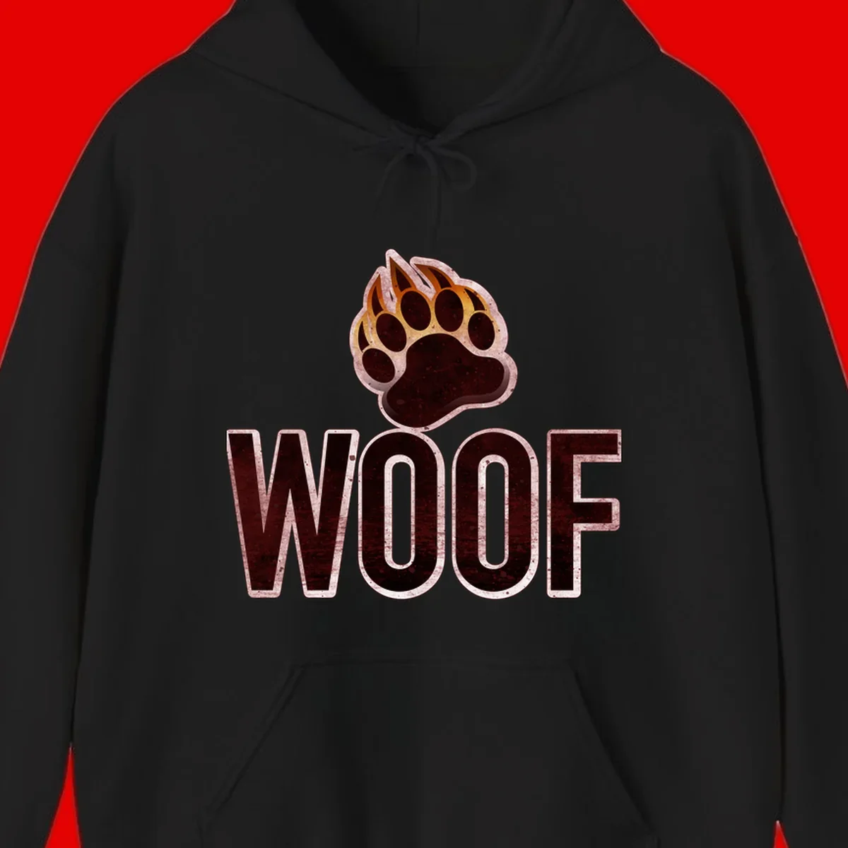 Woof paw print fire design: large paw with orange and gold flame claws above distressed 'WOOF' text