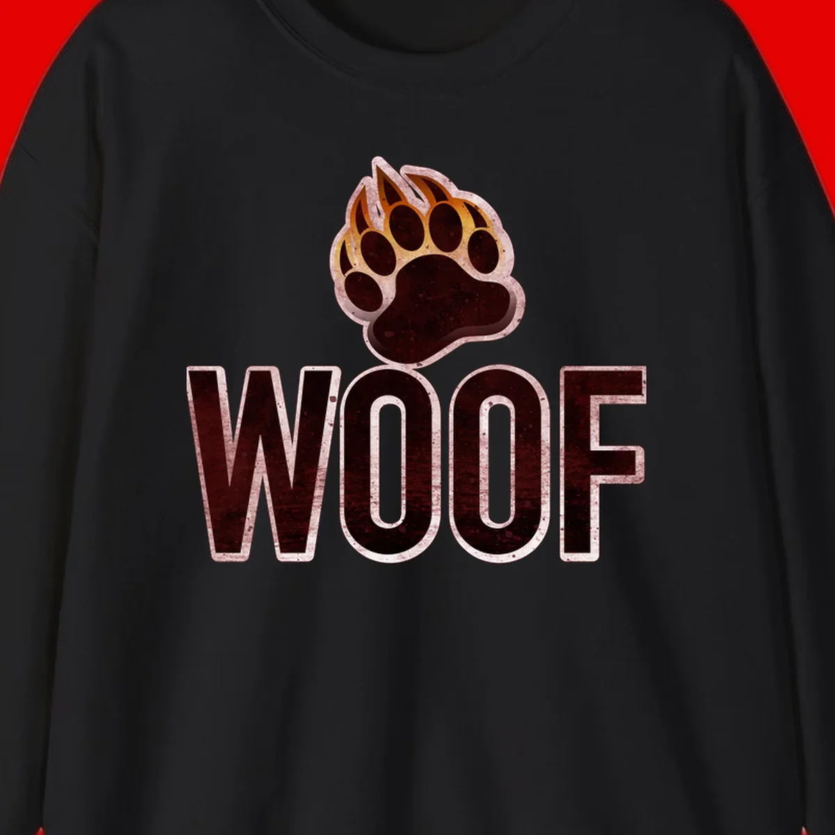 Woof paw print fire design: large paw with orange and gold flame claws above distressed 'WOOF' text