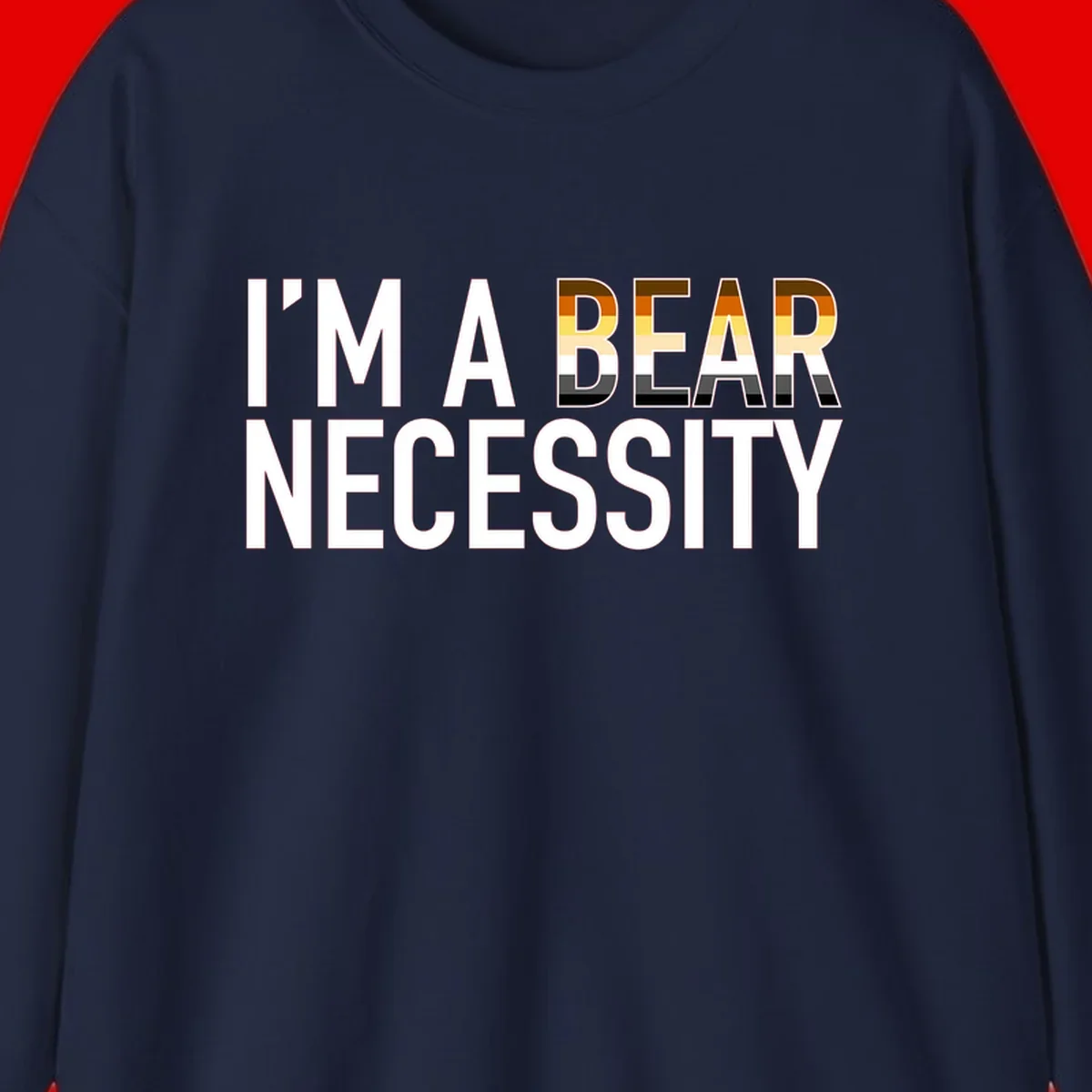Bold 'I'm A Bear Necessity' text design with gradient bear head silhouette in earth tones and white lettering on gray background