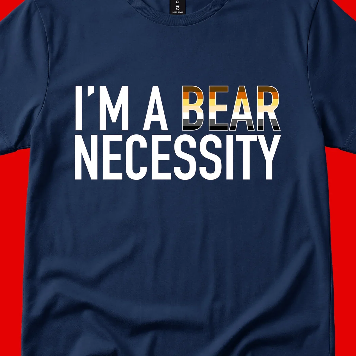 Bold 'I'm A Bear Necessity' text design with gradient bear head silhouette in earth tones and white lettering on gray background